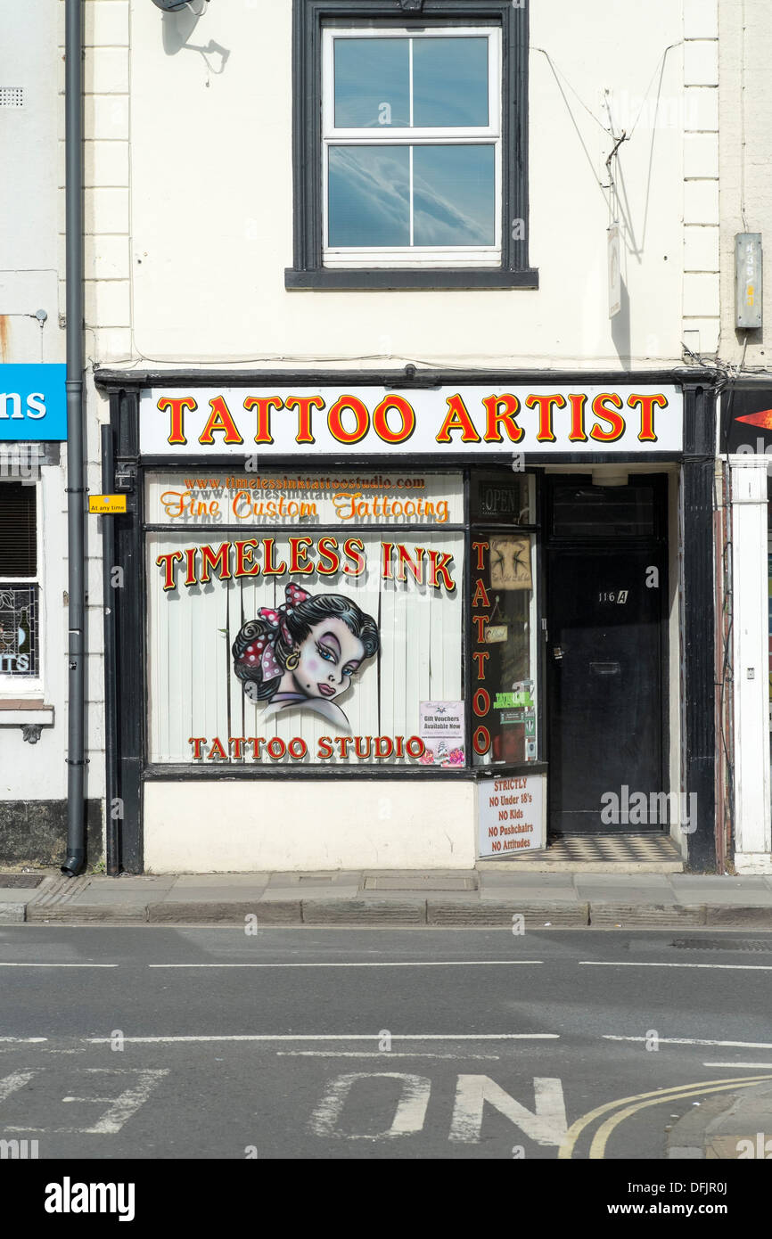 High street Tattoo Artists shop parlour Stock Photo Alamy