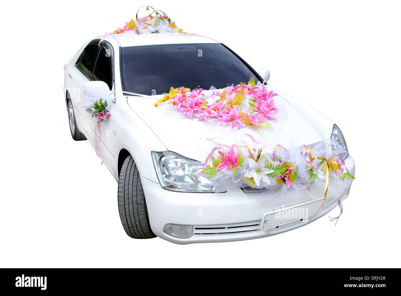 The white wedding car decorated with flowers on a white background. Stock Photo