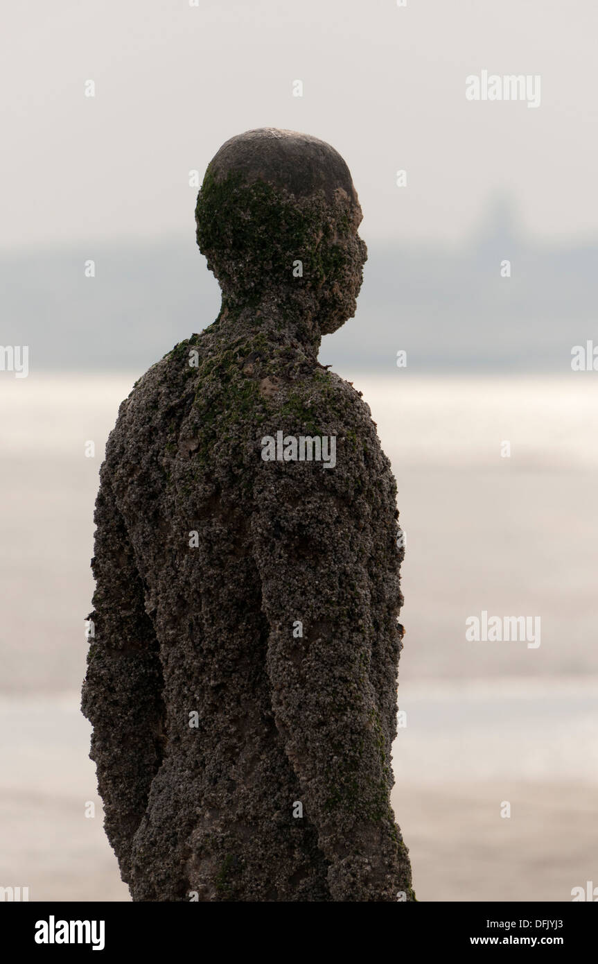 sculpture by Antony Gormley Another Place Crosby Beach Stock Photo - Alamy
