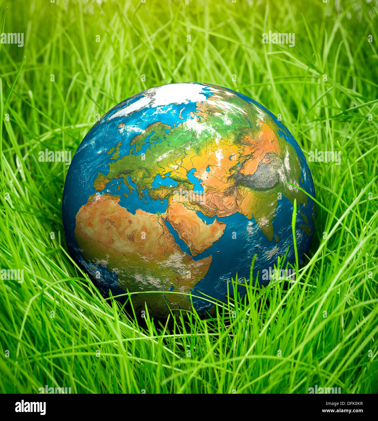 Globe lies on green grass. Concept Earth Day Stock Photo Alamy