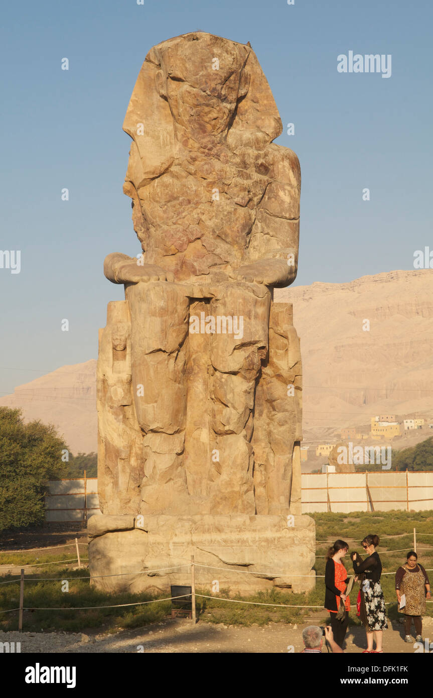 The left (or northern) of the two colossi of Memnon, at Luxor, Egypt. Stock Photo