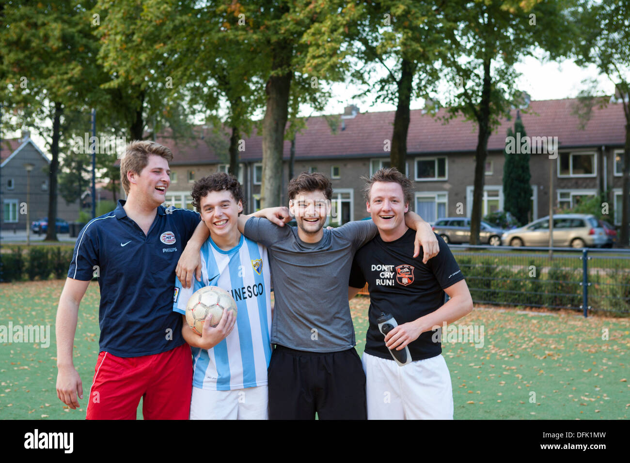 Group of four sportive boys posing at a Johan Cruyff court in the Netherlands Stock Photo