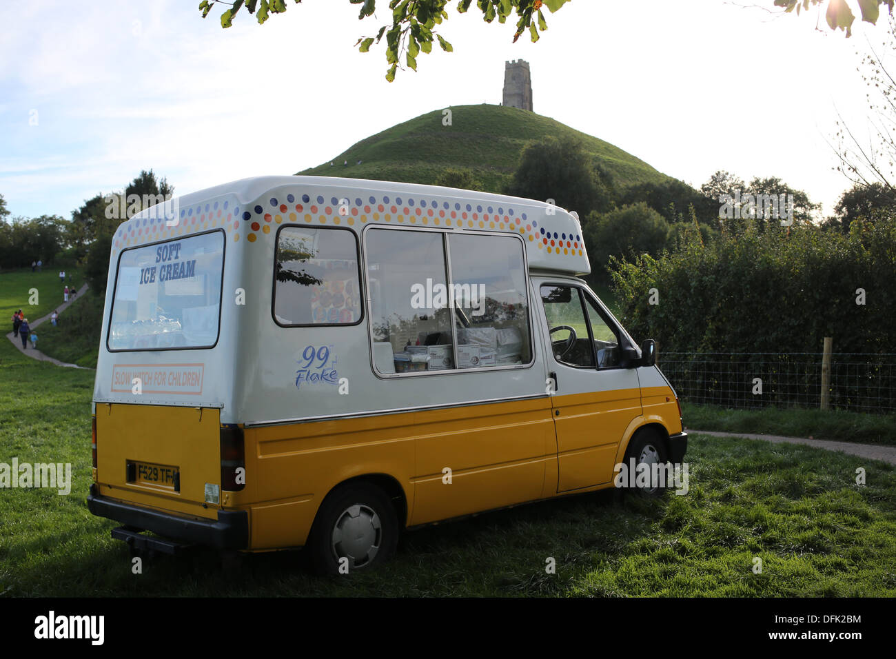 A Ice Cream Van parks at the bottom of Glastonbury Tor in Somerset. Stock Photo