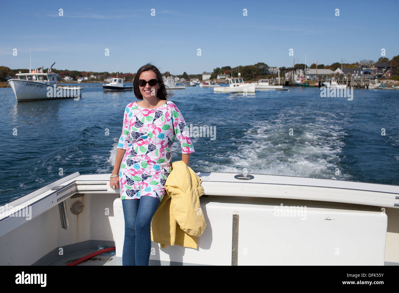 Sally Lerman, journalist, going out on lobster boat. Stock Photo