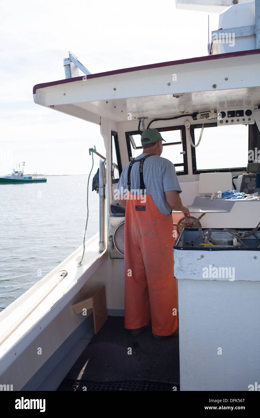 Lobsterman Eric Emmons on lobster boat. ME Maine New England Stock Photo