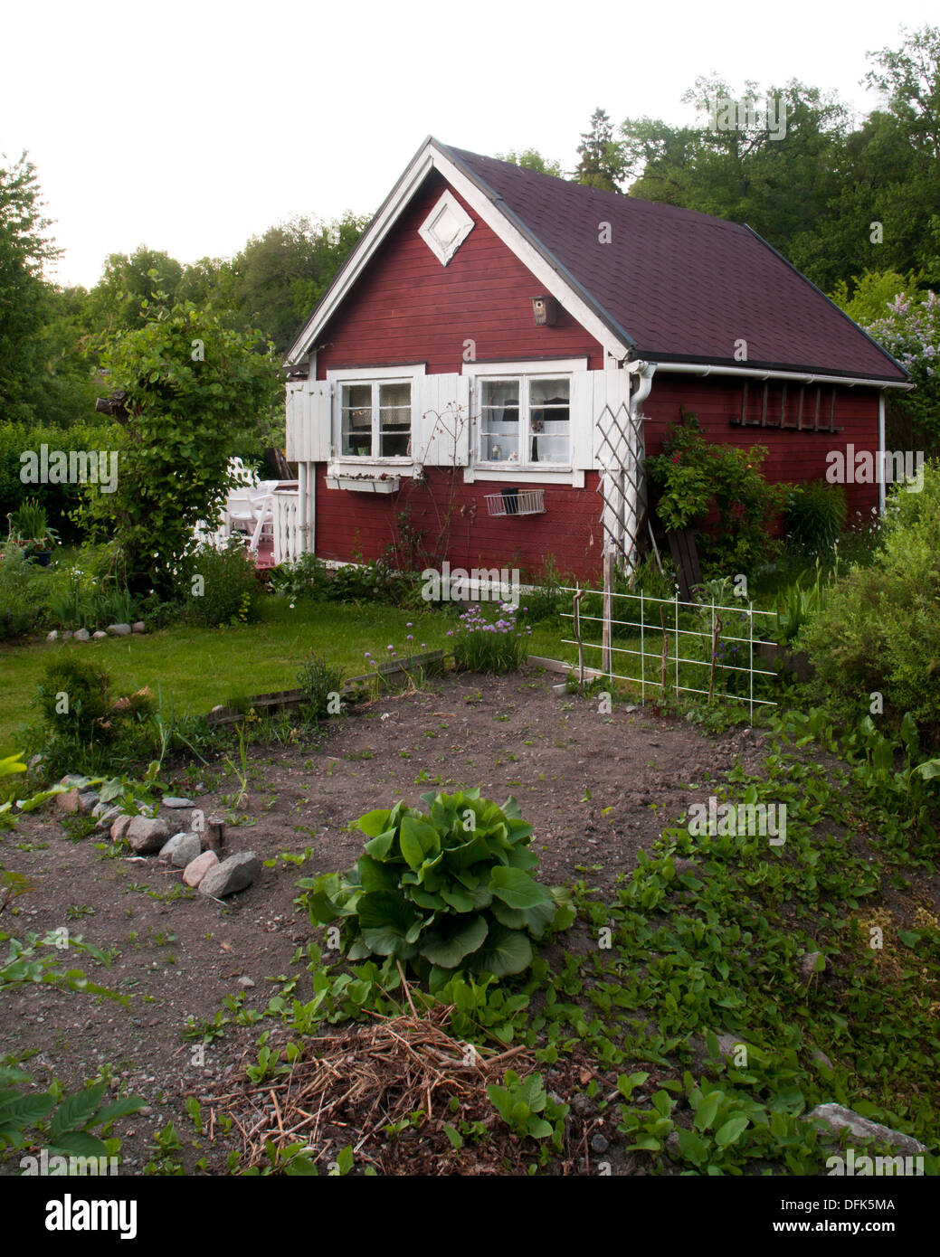 Scandinavian red wooden cottage Stock Photo
