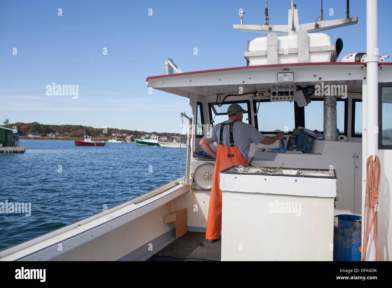Eric Emmons drives his Maine lobster boat out Stock Photo