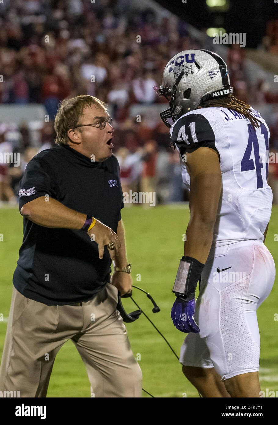 Norman, Oklahoma, USA. 5th Oct, 2013. October 5, 2103: TCU Horned Frogs head coach Gary Patterson talks with TCU Horned Frogs linebacker Jonathan Anderson (41) during the NCAA football game between the TCU Horned Frogs and the Oklahoma Sooners at Gaylord Family - Oklahoma Memorial Stadium in Norman, OK. © csm/Alamy Live News Stock Photo