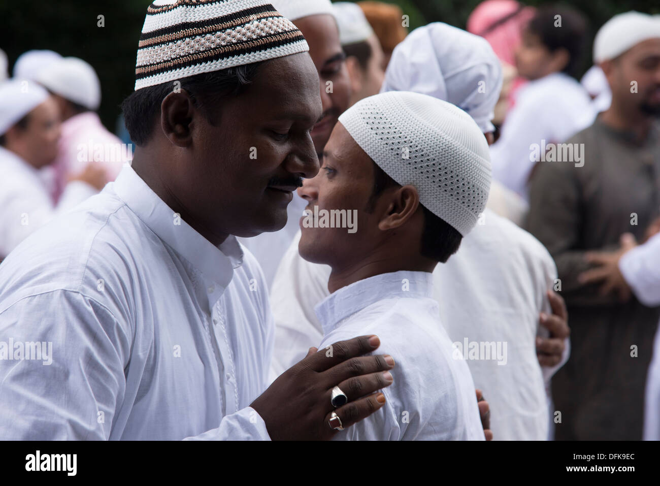 Eid embrace ,after the Ramadan prayer ,over,expressing the feeling of brotherhood. Stock Photo