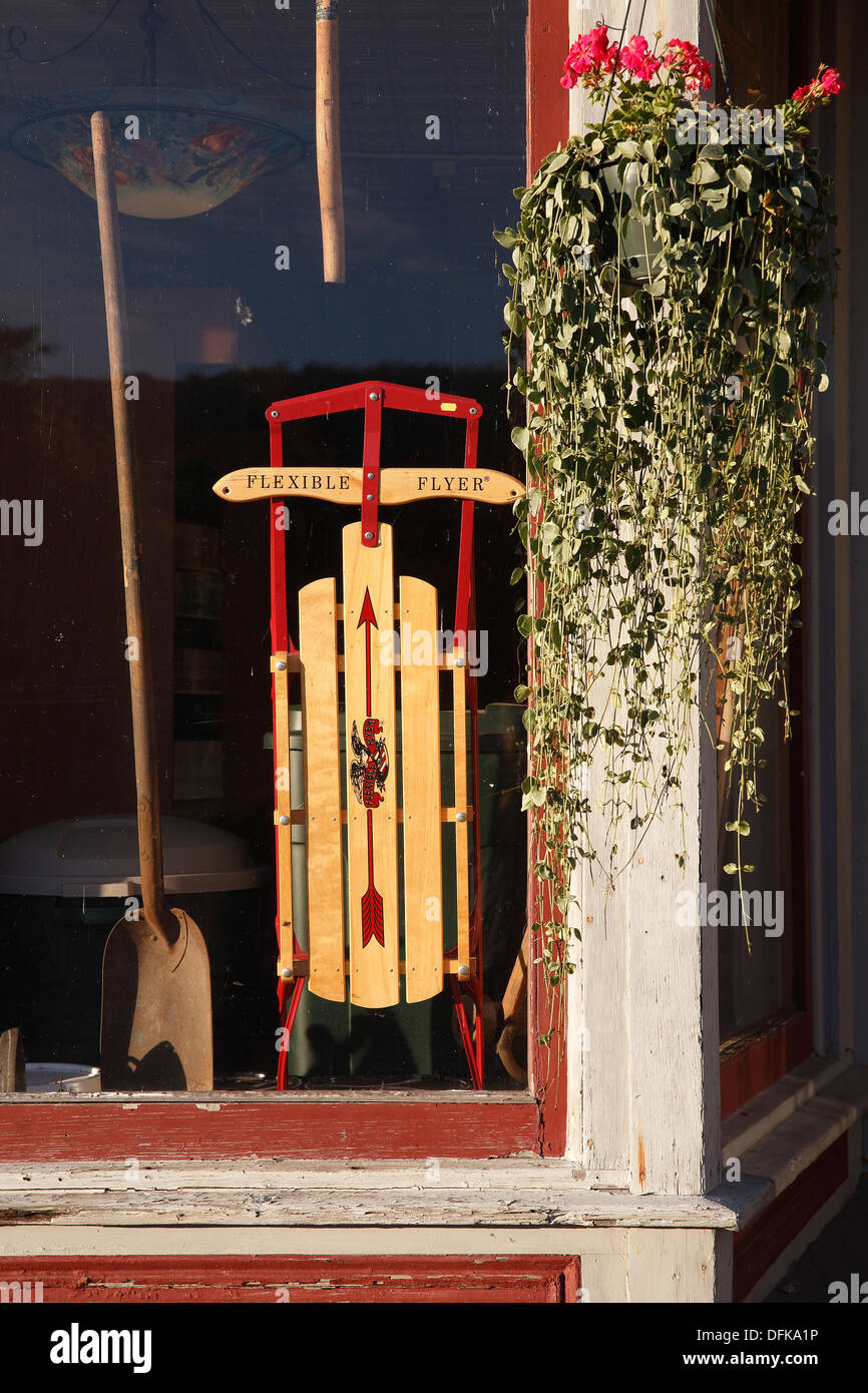 Flexible Flyer sled displayed in a window, New Hampshire, USA Stock Photo
