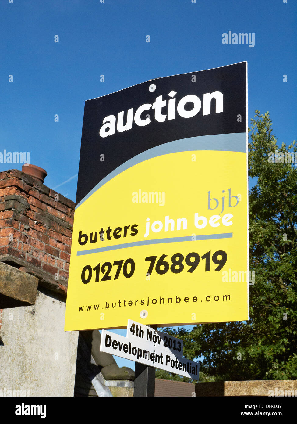 Auction sign by Butters John Bee Estate agents UK Stock Photo Alamy