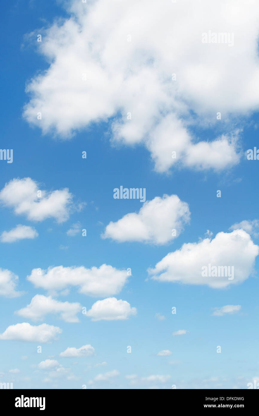 White fluffy clouds in blue sky Stock Photo