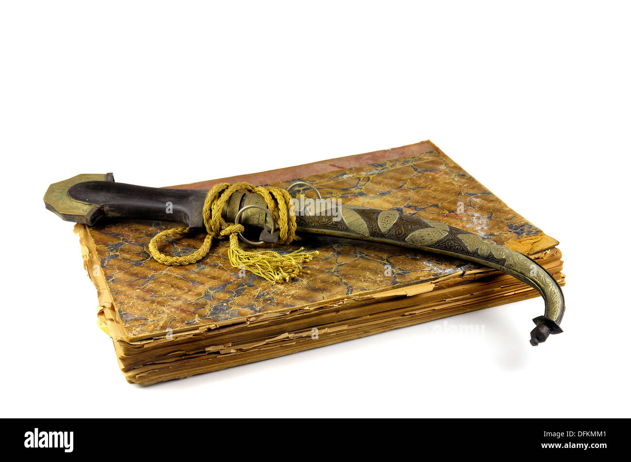 Arab dagger and very old book isolated in white Stock Photo