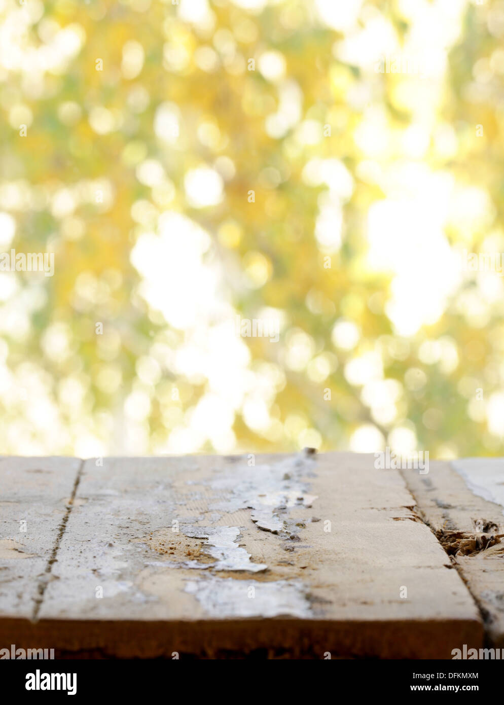 empty wooden deck table with autumn background Stock Photo - Alamy