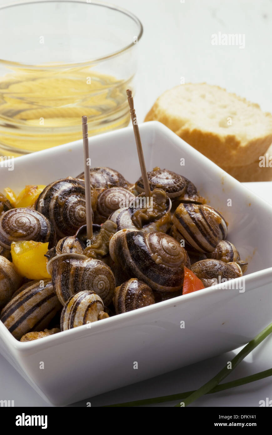 Snails in sauce Stock Photo Alamy
