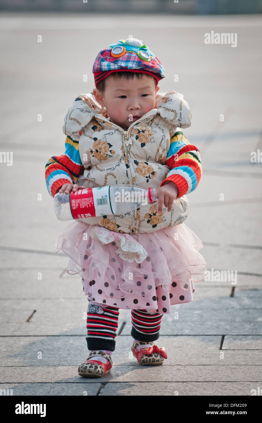 Baby girl in Olympic Green in Chaoyang District, Beijing, China build for the 2008 Summer Olympics Stock Photo