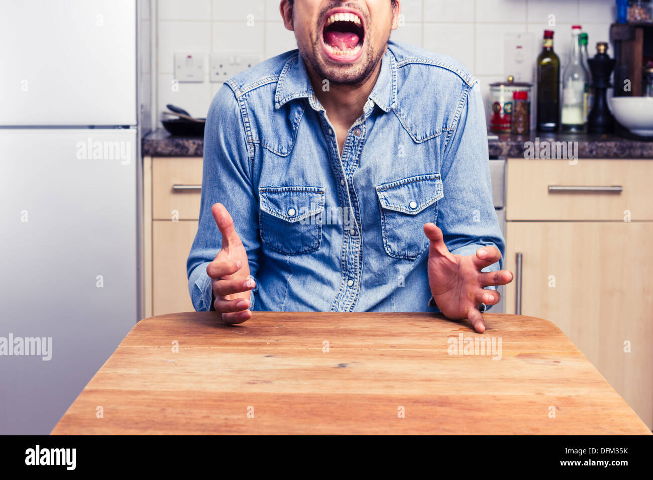 Young man screaming hi-res stock photography and images - Alamy