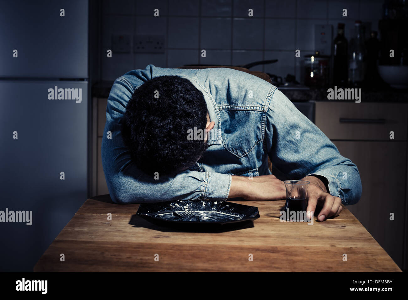 Man at home sad hi-res stock photography and images - Alamy