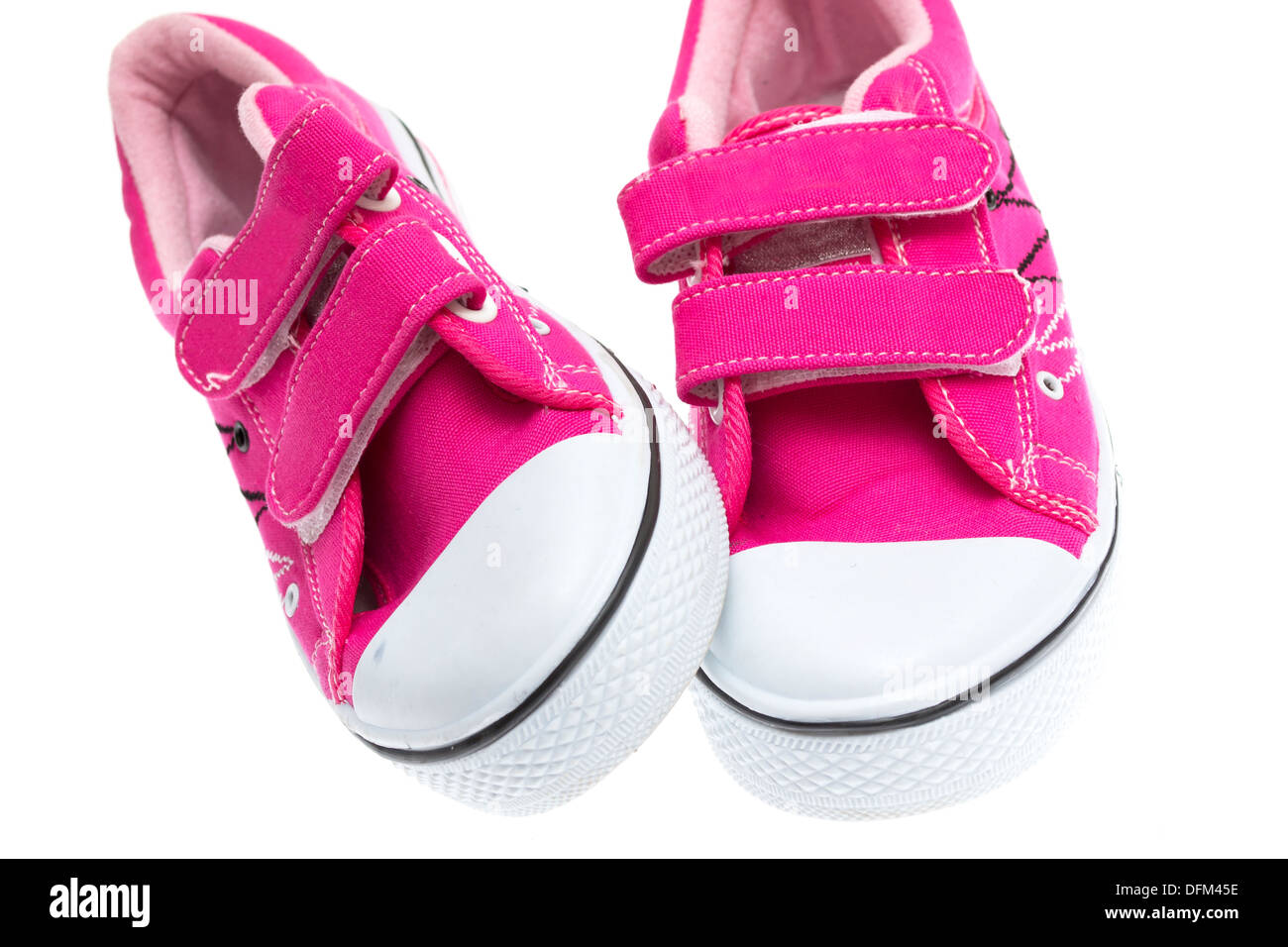 Pink sneakers isolated on white background Stock Photo - Alamy