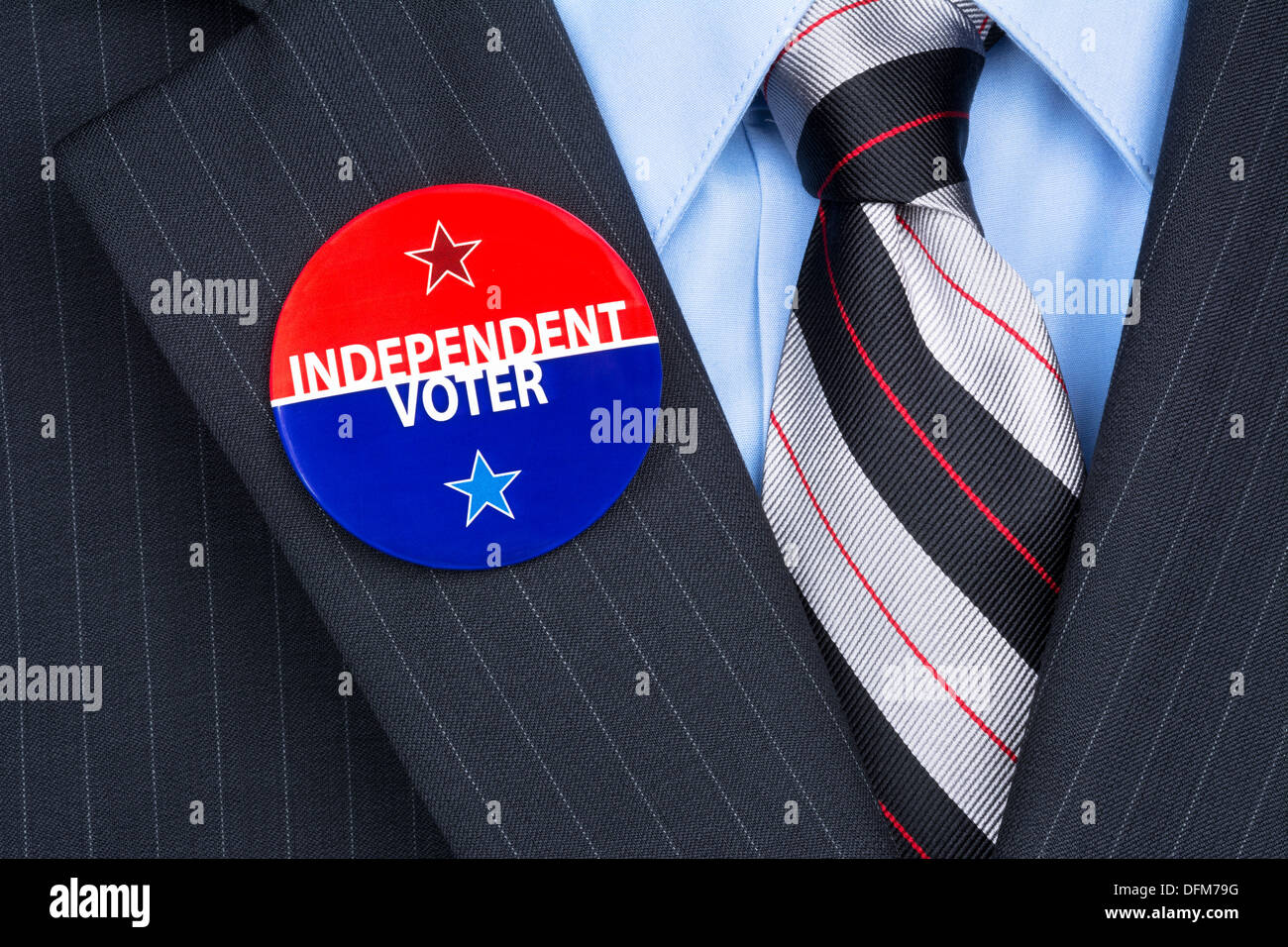 An independent voter wears his party pin on his suit lapel Stock Photo