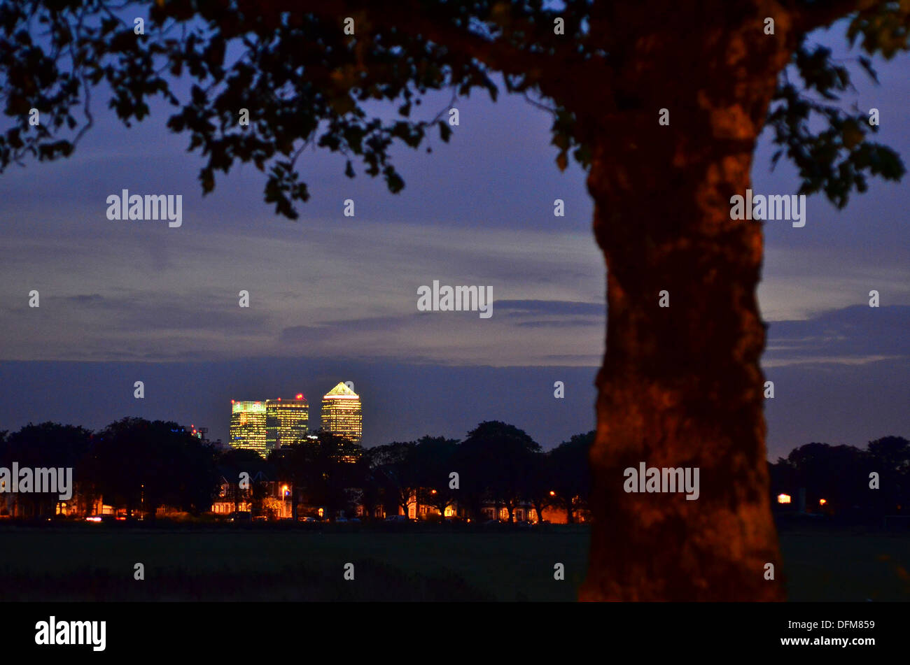 Canary Wharf at dusk photographed from Wanstead Flats, London E11 Stock Photo