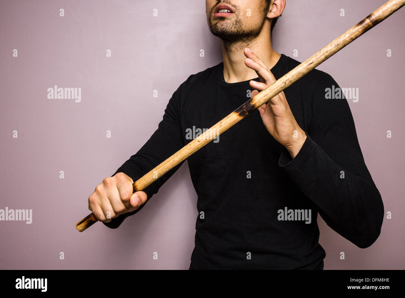 Kung fu stick fighter hi-res stock photography and images - Alamy