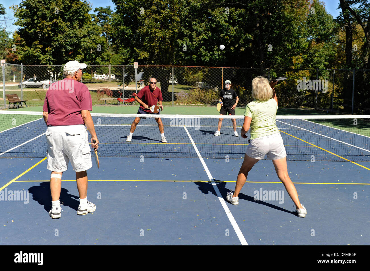 Pickleball is a tennis like sport played by people of all ages Stock