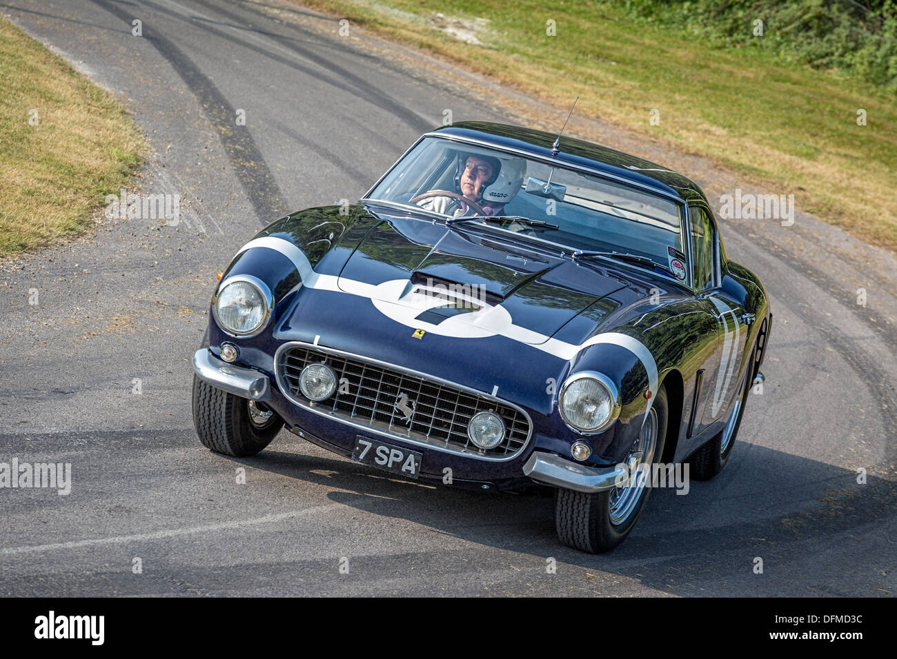 1961 Ferrari 250 GT SWB/C with driver David Cottingham at the 2013 Goodwood Festival of Speed, Sussex, UK. Stock Photo