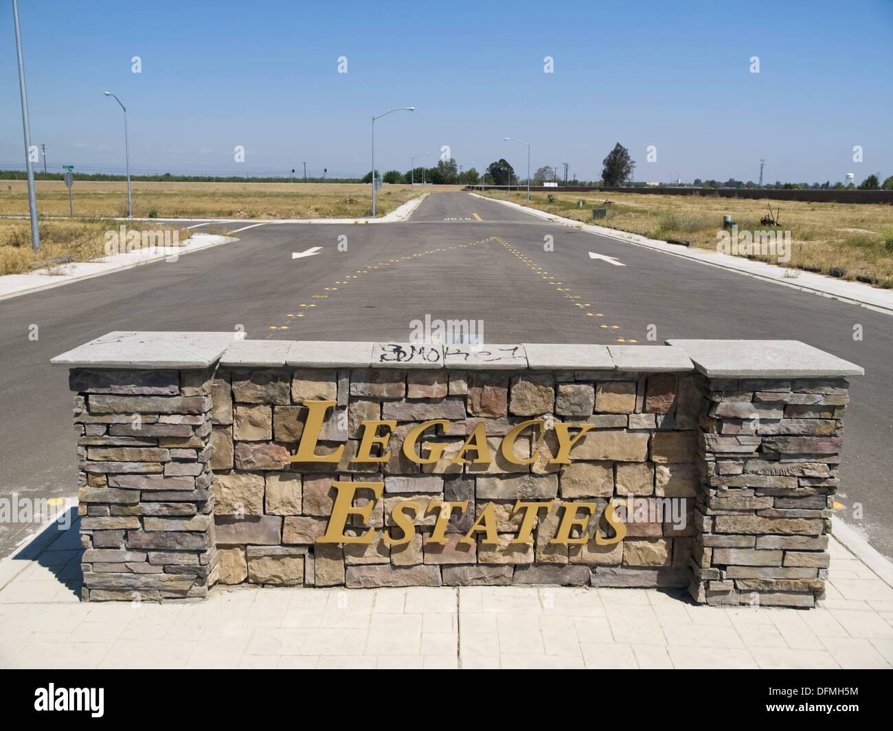 Signs in a failed and abandoned housing development in Winton