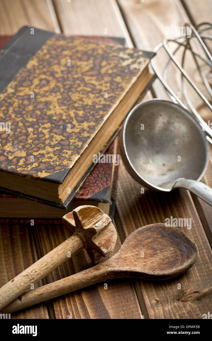 Cookbook Tools Kitchen tools on table in kitchen Stock Photo - Alamy