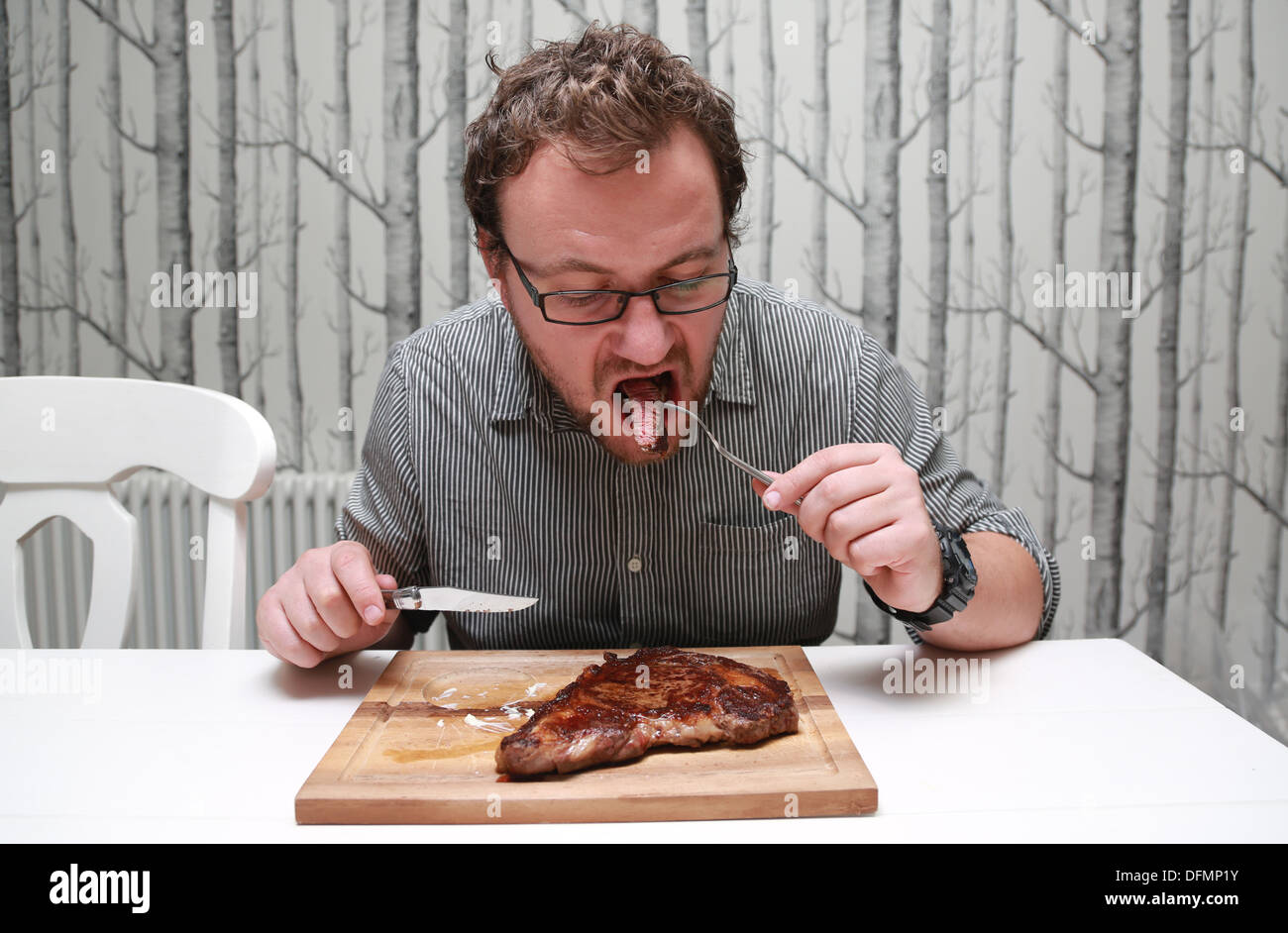 Man eating large juicy steak hires stock photography and images Alamy