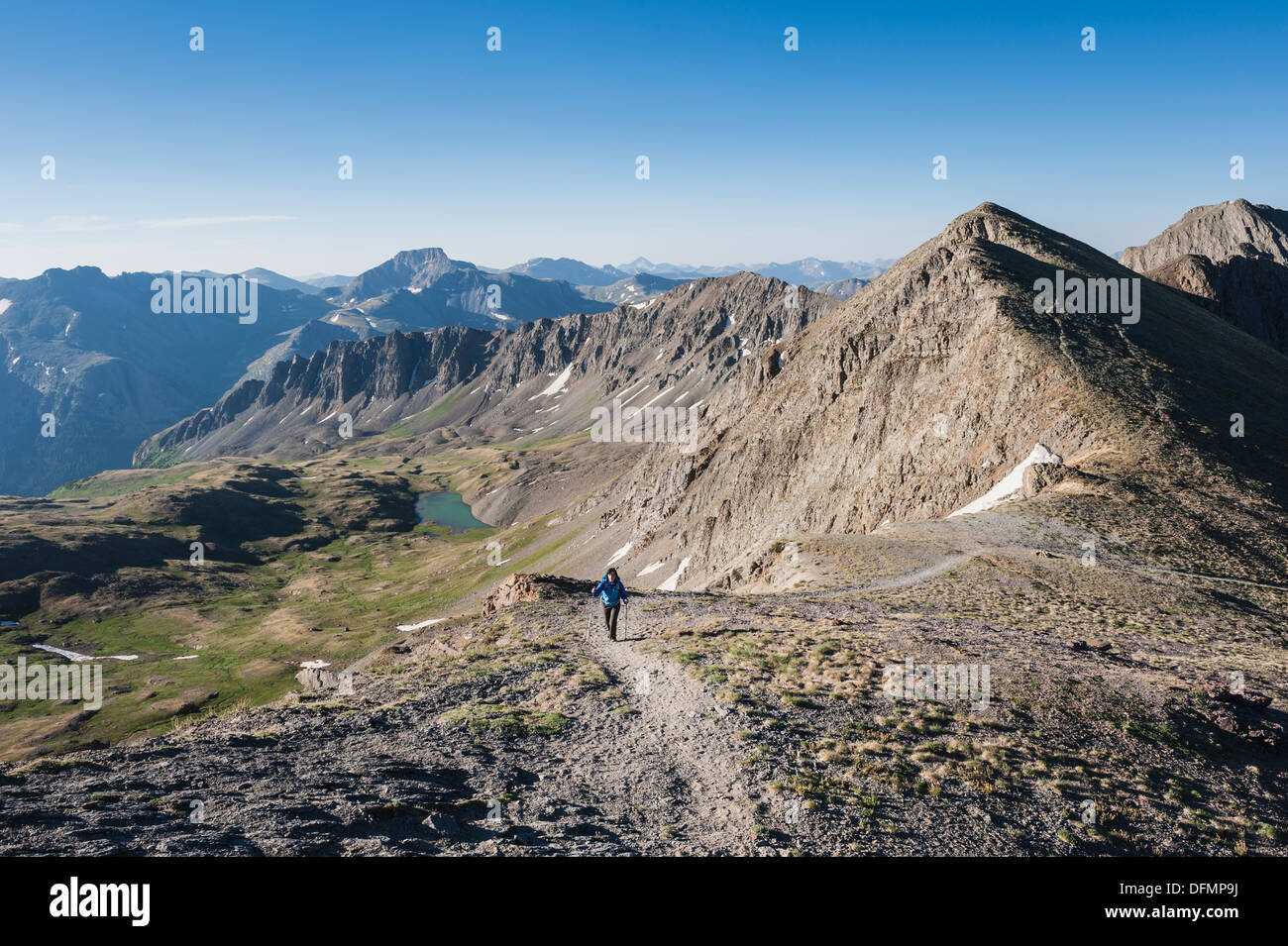 Female hiker on American Basin route to Handies peak (14053 ft), San Juan mountains, Colorado, USA Stock Photo