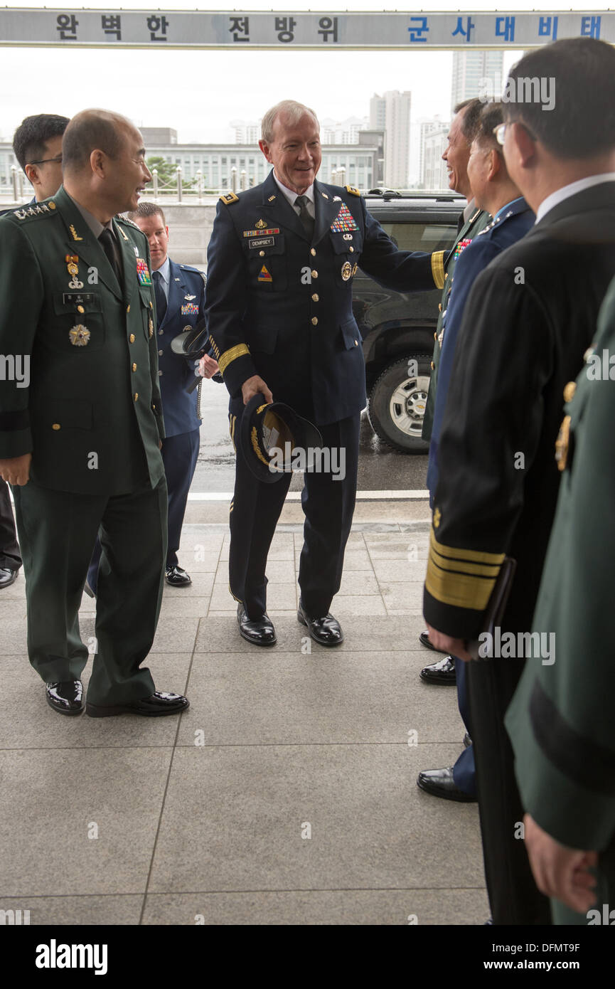 Chairman of the Joint Chiefs of Staff Gen. Martin E. Dempsey is greeted by his South Korean counterpart Gen. Jung Seung Jo during an office call in Seoul, South Korea Sept. 30, 2013. Dempsey is on a four-day trip to South Korea highlighting the strong all Stock Photo