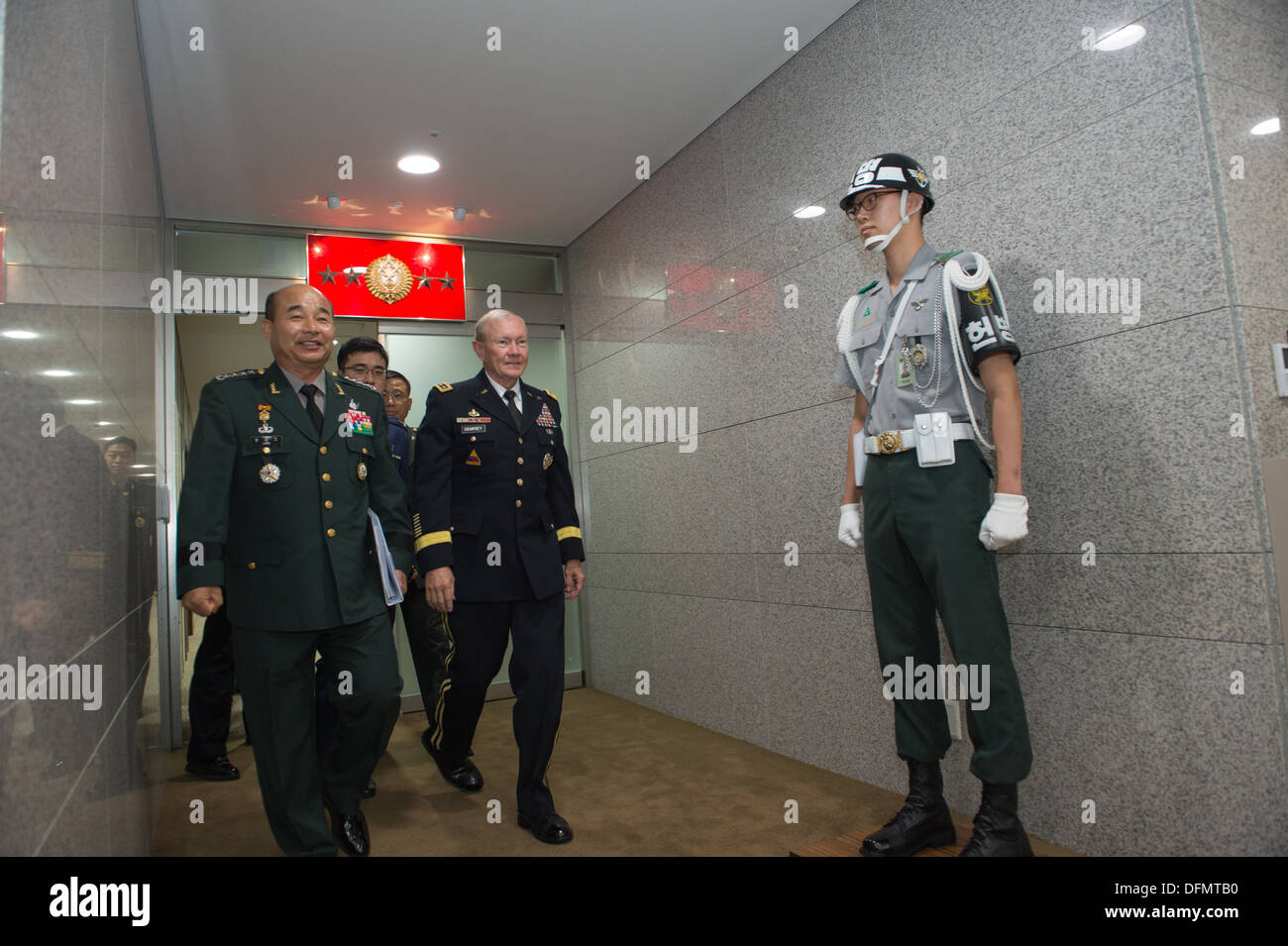 Chairman of the Joint Chiefs of Staff Gen. Martin E. Dempsey is walks with his South Korean counterpart Gen. Jung Seung Jo during an office call in Seoul, South Korea Sept. 30, 2013. Dempsey is on a four-day trip to South Korea highlighting the strong all Stock Photo