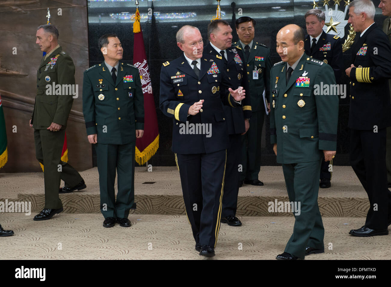 Chairman of the Joint Chiefs of Staff Gen. Martin E. Dempsey talk with his South Korean counterpart Gen. Jung Seung Jo during an office call in Seoul, South Korea Sept. 30, 2013. Dempsey is on a four-day trip to South Korea highlighting the strong allianc Stock Photo
