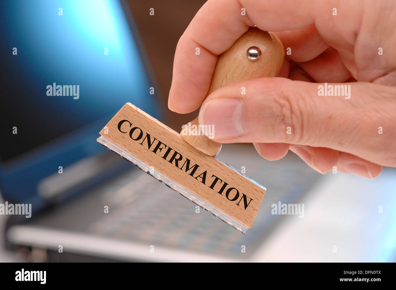 confirmation marked on rubber stamp Stock Photo