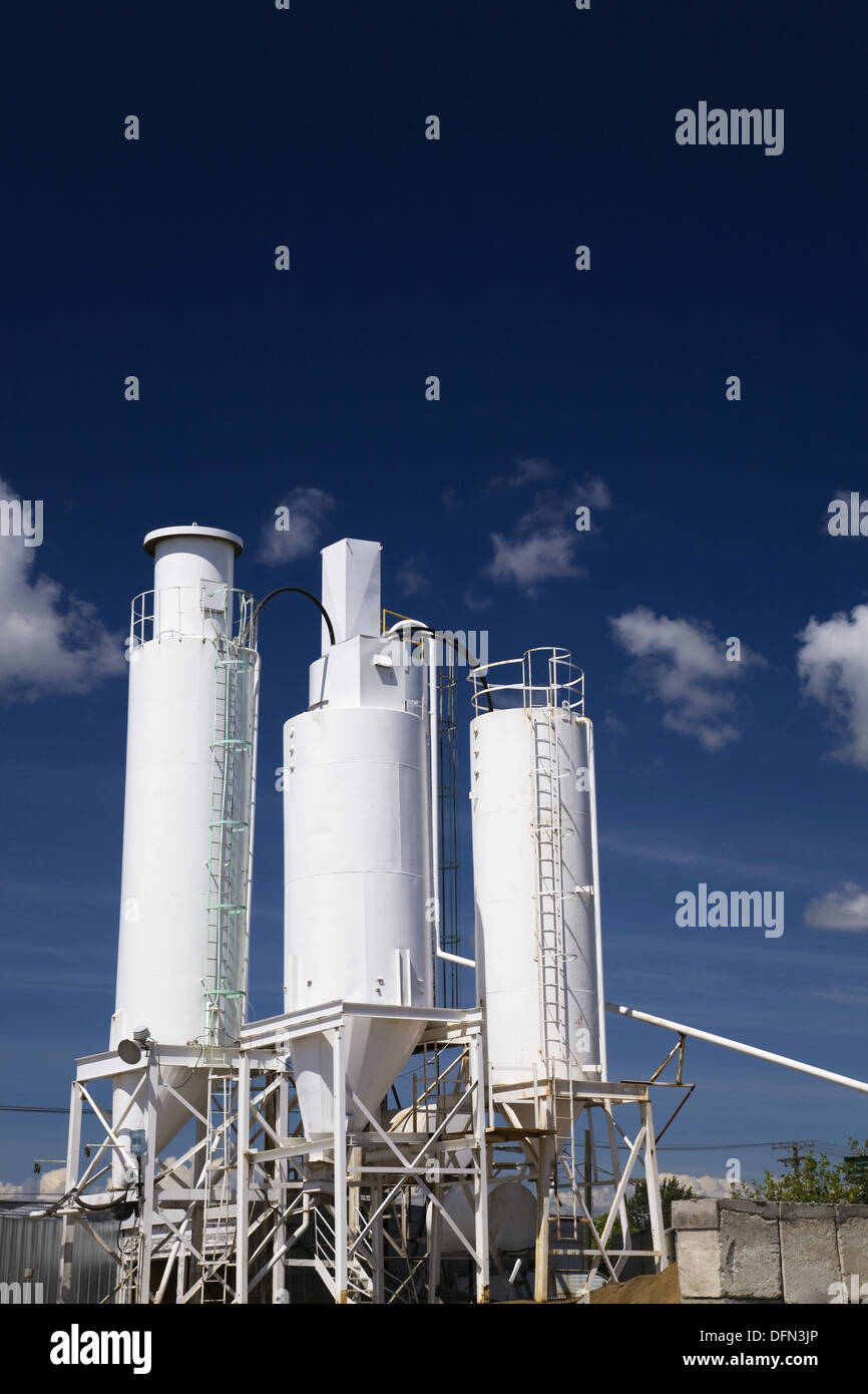 Industrial cement mixing, storage and distribution tanks at a cement making facility, Montreal