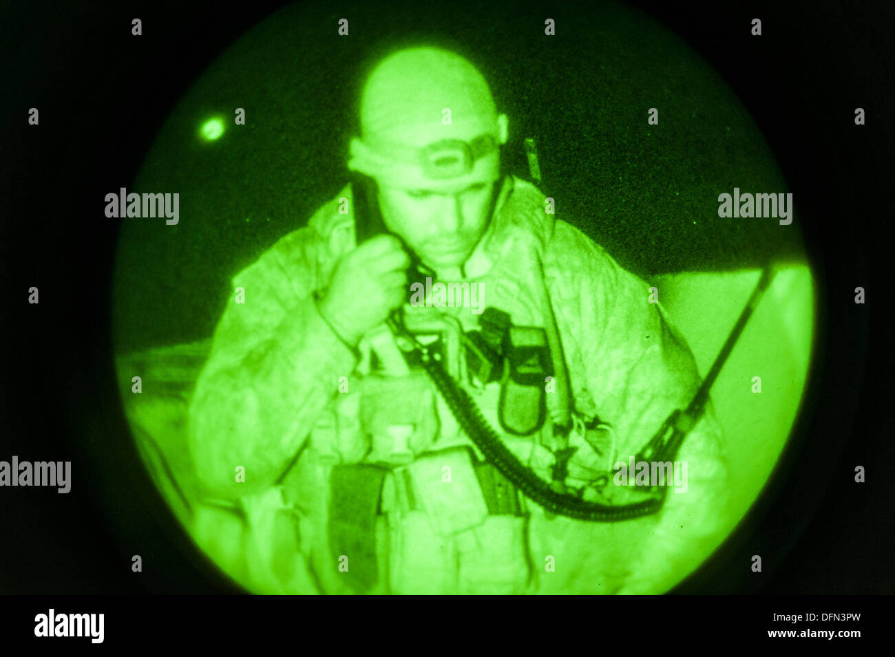 U.S. Marine Capt. Erich Lloyd, 1st Air Naval Gunfire Liaison Company joint terminal attack controller, works a close-air support late night mission during exercise Mountain Roundup 2013 at Mountain Home Air Force Base, Idaho, Oct. 2, 2013. The ANGLICO Mar Stock Photo