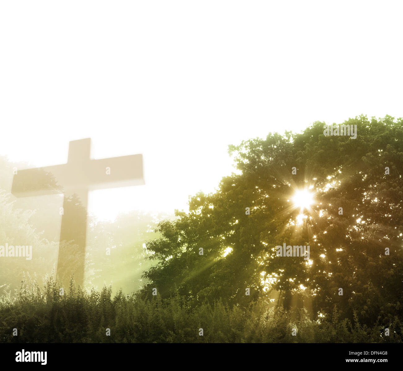 Early morning rays of sunlight and religious cross. Copy space Stock Photo