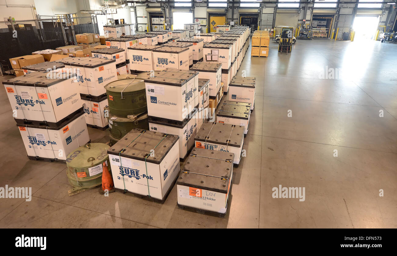 Outbound cargo is lined up inside the 436th Aerial Port Squadron warehouse but with no trucks contracted to move the cargo it remains static as of Oct. 4, 2013, at Dover Air Force Base, Del. Cargo movement operations quickly came to a stand-still at the A Stock Photo