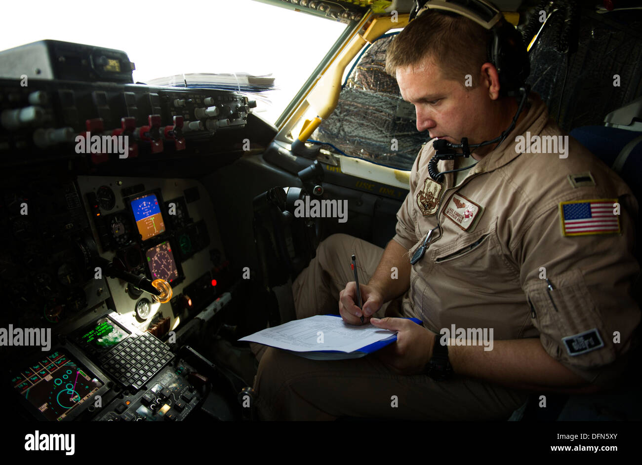 U.S. Air Force 1st Lt. Jake Kummrow, 340th Expeditionary Air Refueling Squadron KC-135 Stratotanker pilot, prepares for take-off to complete an air refueling mission over Afghanistan Oct. 2, 2013. Kummrow is deployed from the 128th Air Refueling Wing, Wis Stock Photo