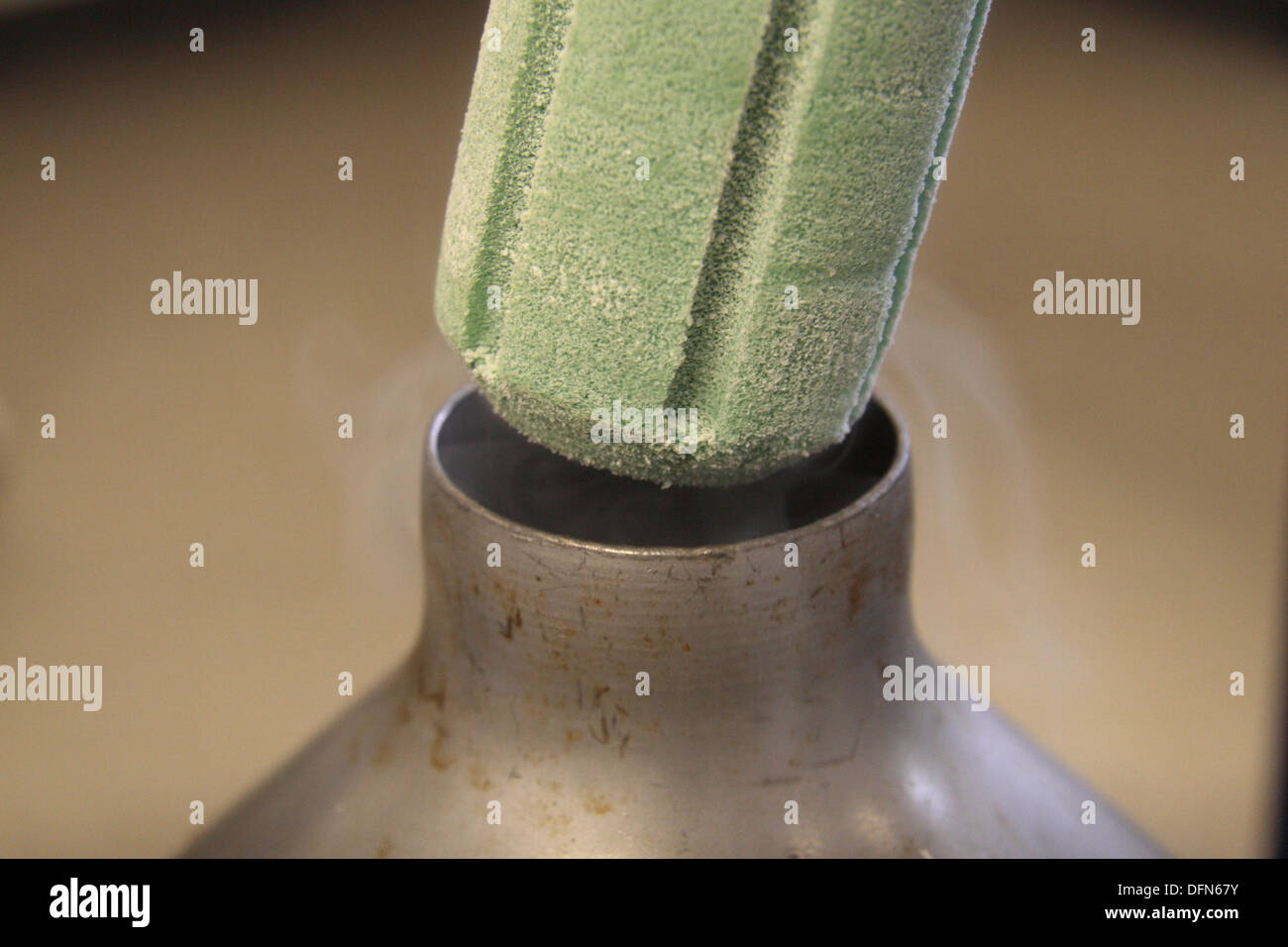 A dewar containing liquid nitrogen (LN2) borrowed from the NPL being used in a UK school for demonstrations. Stock Photo