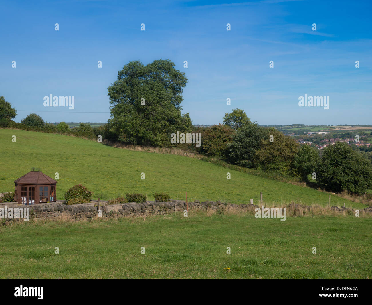 View of hills, and trees on a sunny day near Holbrook, Belper, in Derbyshire, United Kingdom. UK Stock Photo