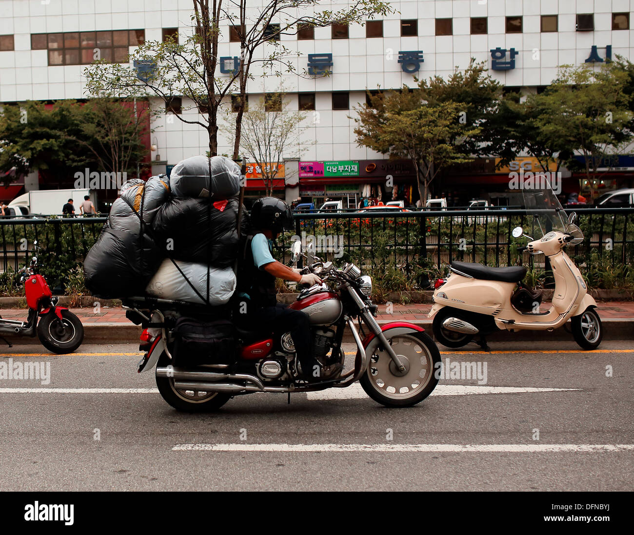 Seoul motorbike delivery Stock Photo Alamy