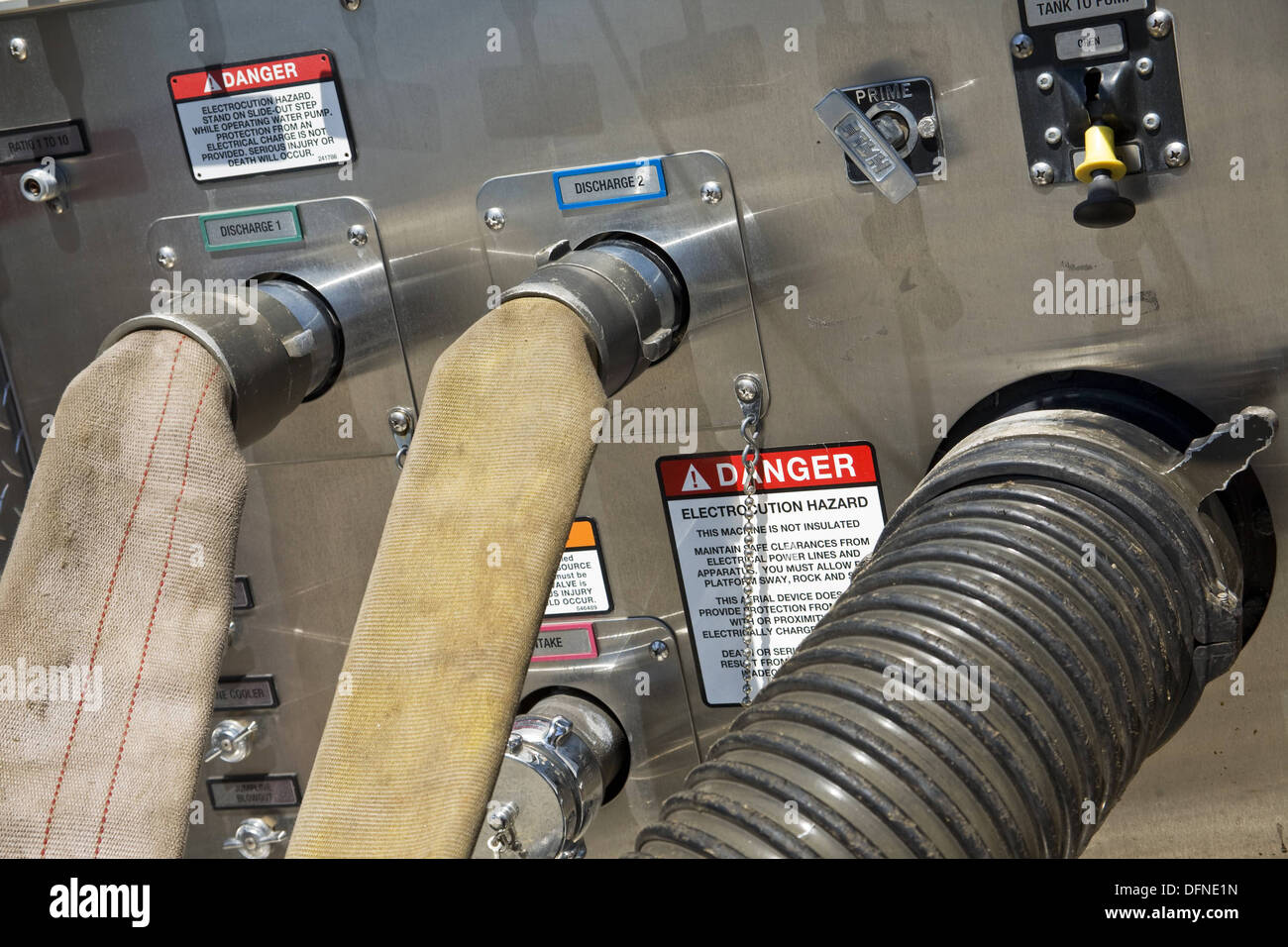 Hoses attached to a fire truck Stock Photo Alamy