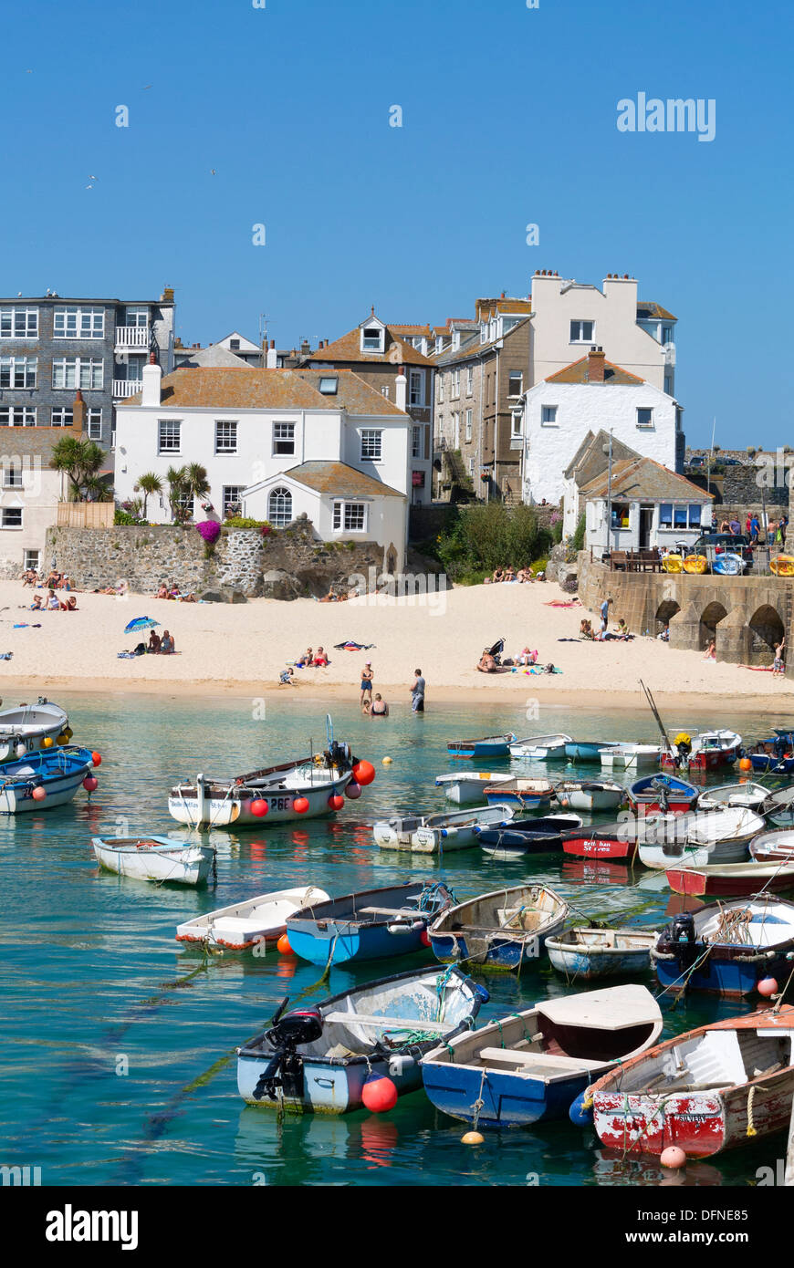 St. Ives colourful small fishing boats and the harbour beach, Cornwall England. Stock Photo