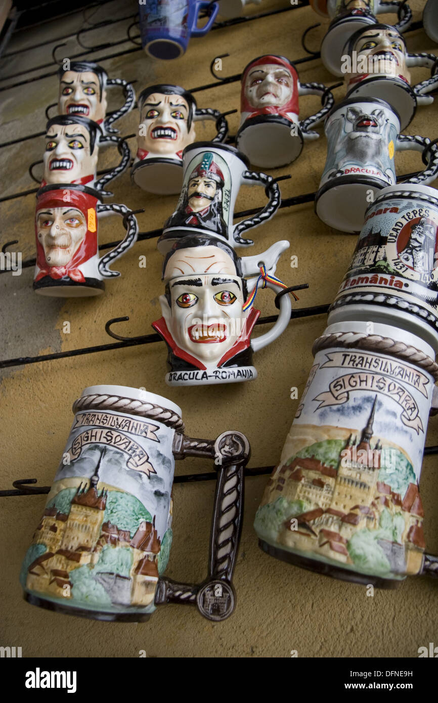 Mugs decorated with Vlad Tepes also known as Dracula on sale in the old town of Sighisoara, Transylvania. Romania. Stock Photo