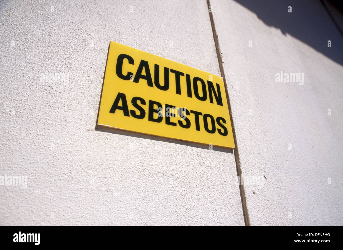 Sign warning that fireretarding asbestos was used in the construction
