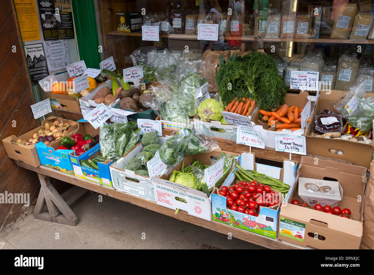 Lots of fruit and vegetables outside a greengrocer shop in Totnes, Devon England. Stock Photo