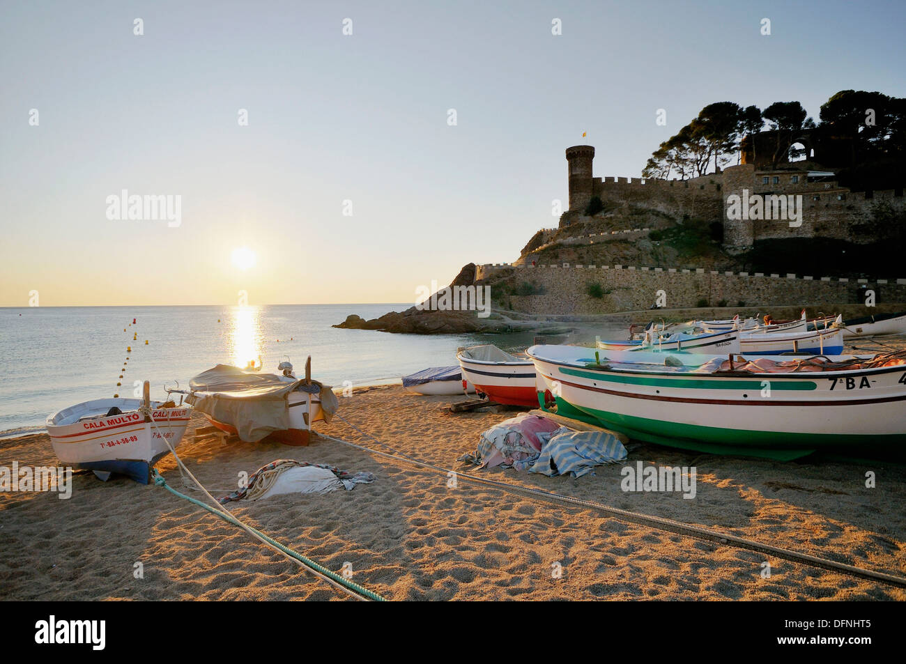 Typical fishing boats on the beach at sunrise, Tossa de Mar, Costa